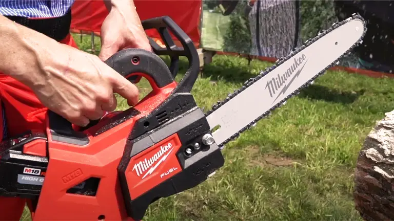 Person cutting wood with a Milwaukee M18 FUEL Chainsaw