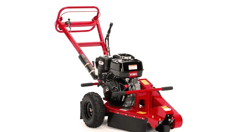 Toro SGR-13 Handle Bar Stump Grinder with a red frame and black engine, isolated on a white background