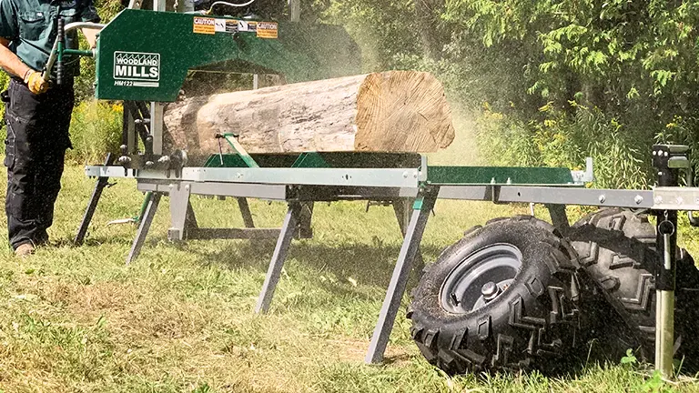 Woodland Mills HM122 Bushlander sawmill in action, cutting a log