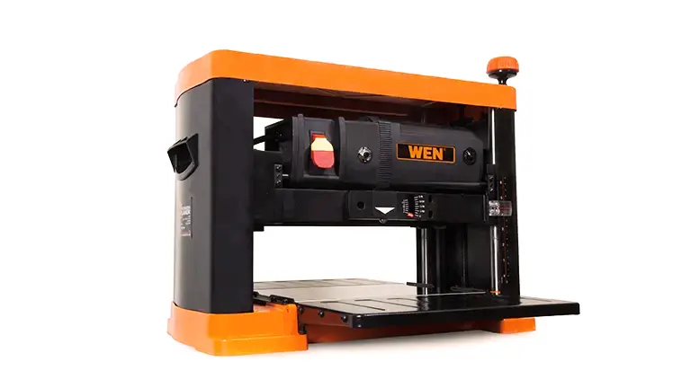 Orange and black WEN 6552T Benchtop Planer with a flat base and top handle