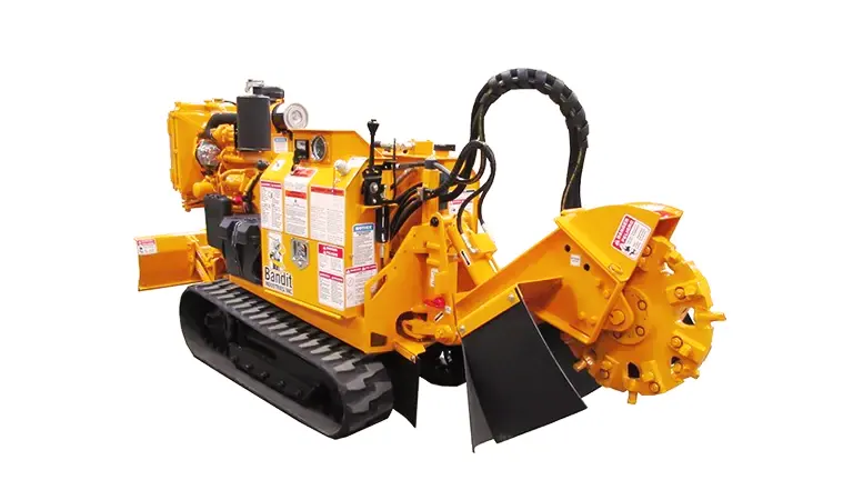 Bandit 2550XP Stump Grinder with black, sturdy rubber tracks and a large, powerful grinding wheel