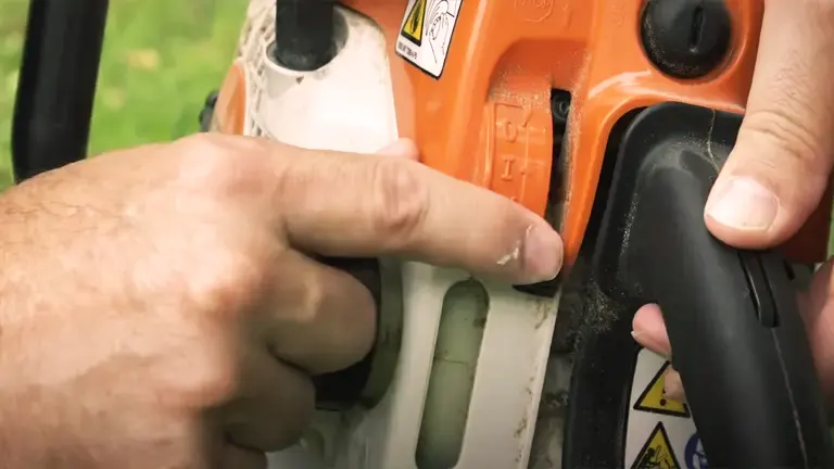Close-up of a STIHL MS 251 C-BE chainsaw in operation.