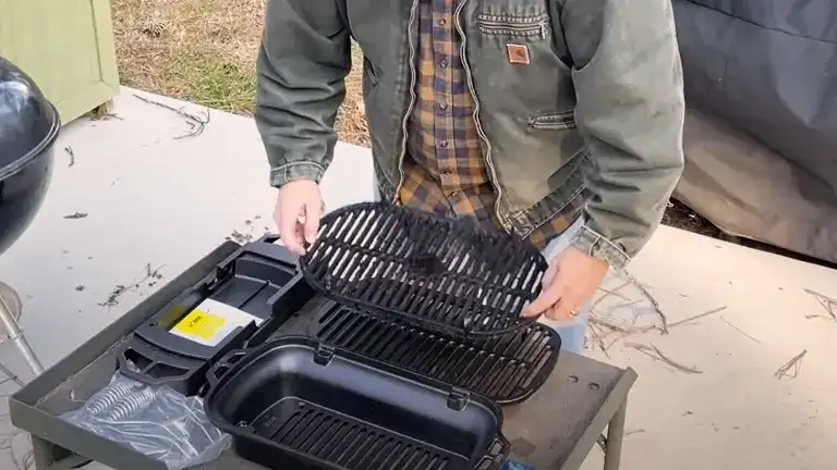 https://forestry.com/wp/wp-content/uploads/2023/10/Lodge-Cast-Iron-Hibachi-Style-Charcoal-Burning-Portable-Sportsmans-Grill-15.webp