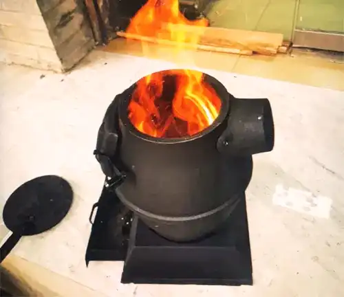 https://forestry.com/wp/wp-content/uploads/2023/10/Pure-Cast-Iron-Outdoor-Wood-Camping-Burning-Stove-Review-12.webp