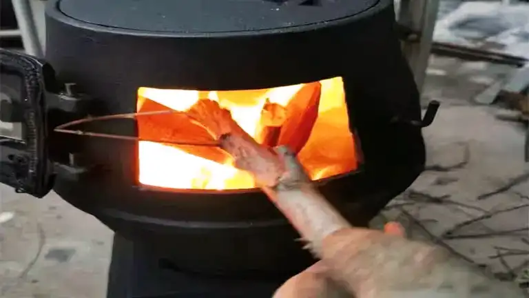 https://forestry.com/wp/wp-content/uploads/2023/10/Pure-Cast-Iron-Outdoor-Wood-Camping-Burning-Stove-Review-6.webp