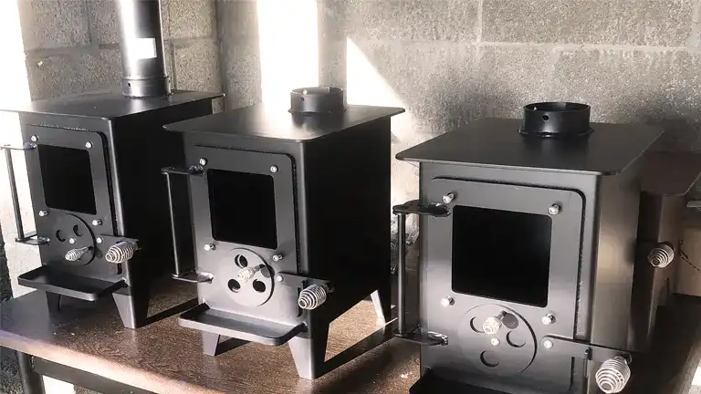 https://forestry.com/wp/wp-content/uploads/2023/10/Tiny-Wood-Burning-RV-Stove-Review-11.webp