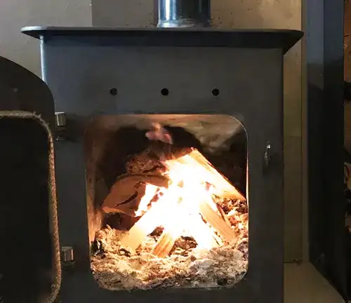 Burning Wood inside of Tiny Wood Burning RV Stove