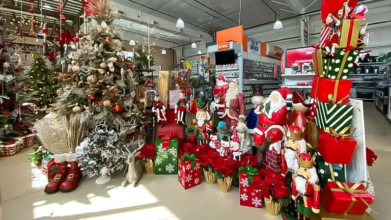 Christmas decorations and gifts on display in a store.