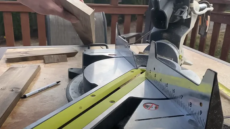 Ryobi TSS103 10” Sliding Compound Miter Saw in use on a wooden deck