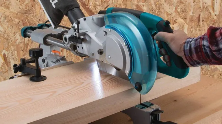 A Makita LS0815F 8-1/2” Slide Compound Miter Saw with a blade in place and the saw arm extended, ready for a crosscut