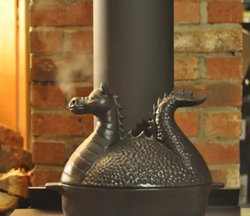Dragon-shaped kettle with smoke coming out of its mouth against a brick background.