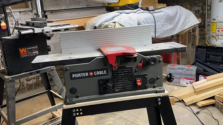 Porter-Cable wood jointer in workshop setting.