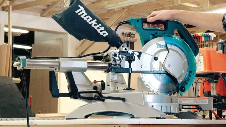 Blue and silver Makita LS1018 10” Dual Slide Compound Miter Saw in a workshop setting