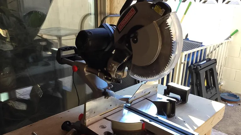 ADMIRAL 12" Dual Bevel Sliding Compound Miter Saw in use, cutting wood