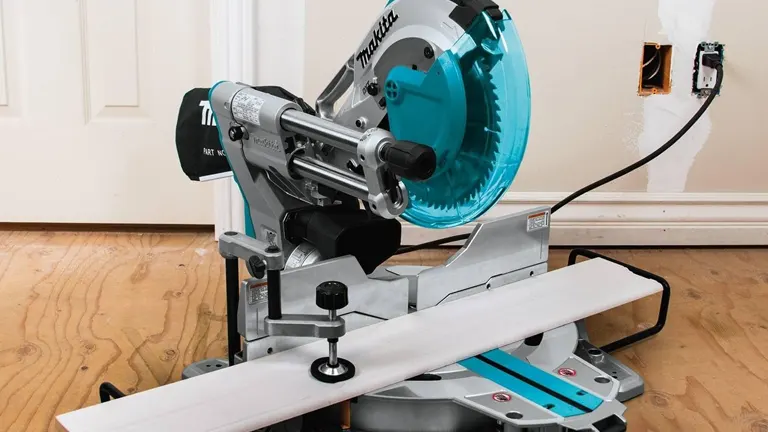 Makita LS1019L 10" Dual-Bevel Sliding Compound Miter Saw with Laser on wooden floor