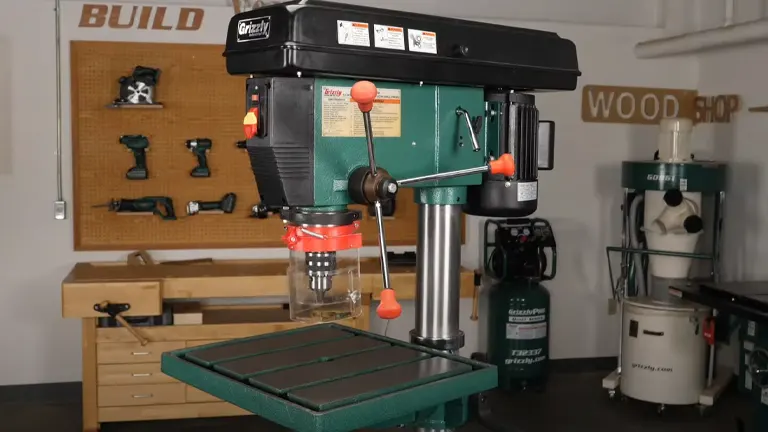 Table drill in wood shop.