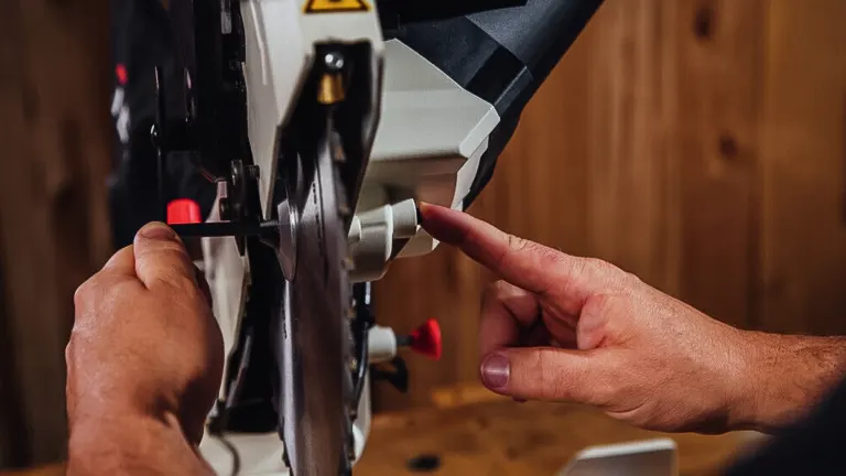 Close-up of JET JMS-10X 707210 10-Inch Dual-Bevel Compound Miter Saw in use