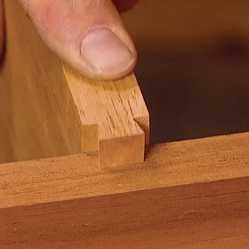 Close up of a sliding dovetail joint being assembled