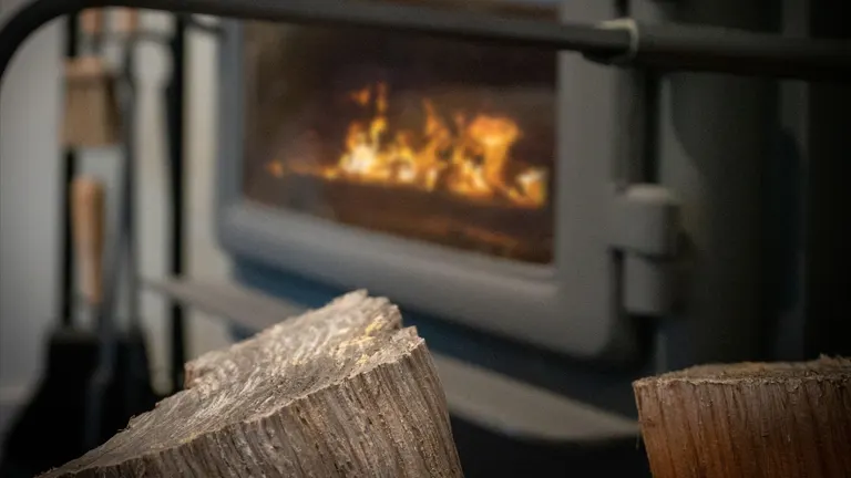 Wood burning stove with firewood