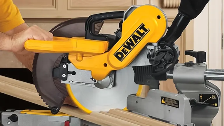 DeWalt DW717 10” Double-Bevel Sliding Compound Miter Saw in use, cutting wood on a workbench