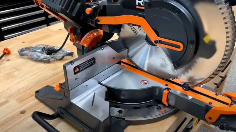 Ridgid R4251 12" Dual-Bevel Sliding Miter Saw on a gray workbench in a workshop