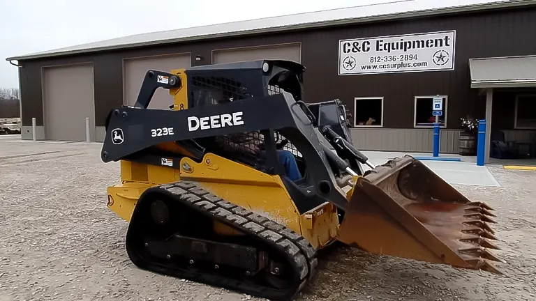 Erskine Rock Hound with John Deere 323E cleans up a Rocky Mess