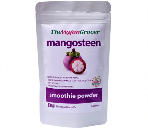 White pouch of TheVeganGrocer mangosteen smoothie powder with a purple label and a picture of a mangosteen fruit
