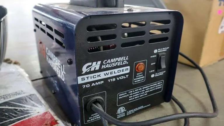 Campbell Hausfeld 115v Stick Welder with Accessory Kit on a workbench