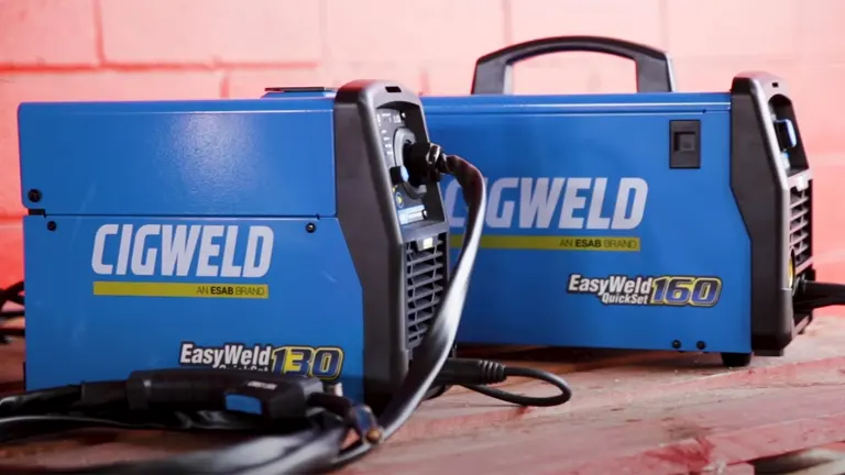 Blue Cigweld EasyWeld 160 MIG Stick Welders and black torch on a red brick background