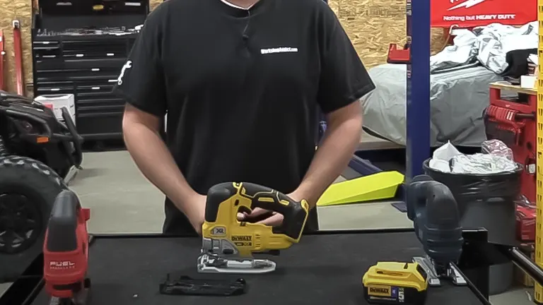 Person holding DeWalt T32331 - 20V Max XR Jigsaw Kit in workshop.