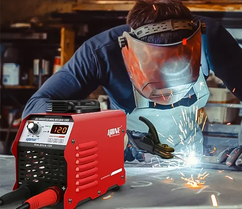Person welding with a HONE Stick Welder machine in a workshop