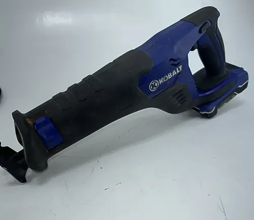 A Kobalt 24-volt Max-Volt Variable Speed Cordless Reciprocating Saw with a 1-1/4-inch blade, ready for cutting wood, metal, and plastic