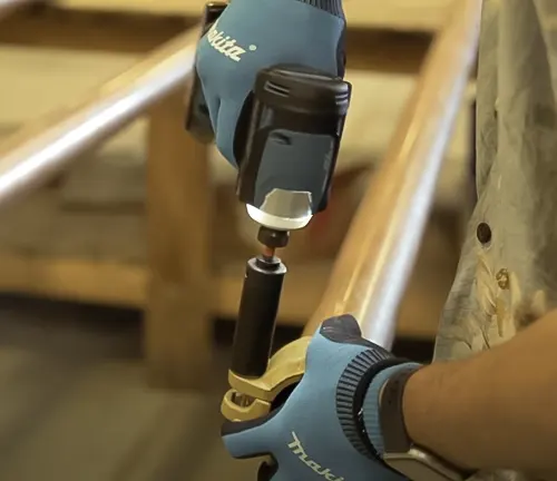 Makita 18V XDT19 Brushless Cordless Impact Driver in use on wood.