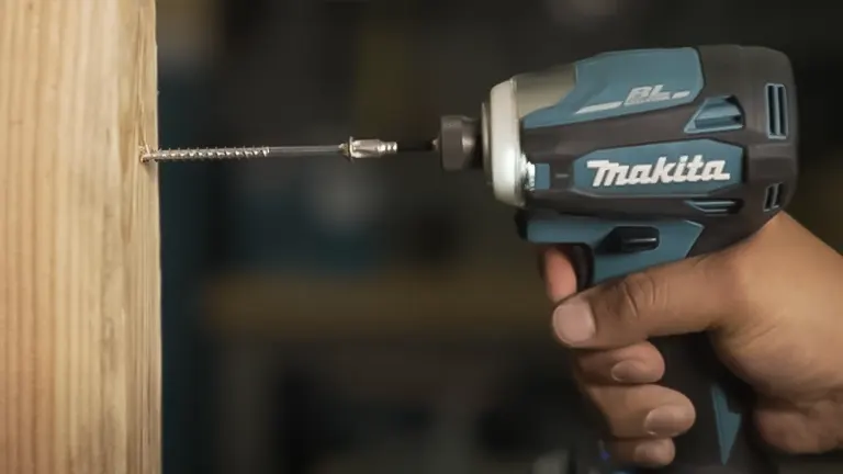 Makita 18V XDT19 Brushless Cordless Impact Driver drilling into wood.