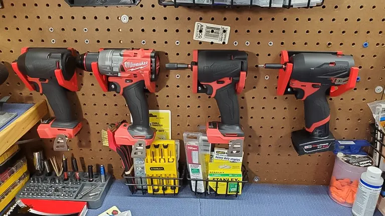Display of Milwaukee power tools and Stanley, DeWalt accessories in a hardware store.
