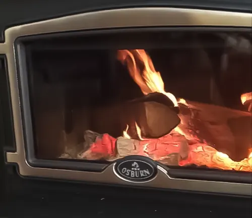 Close-up of a fireplace with a burning fire, branded as Osburn.