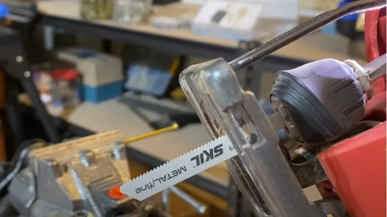 Close up of Skil 20V 7/8" Stroke Orbital Jigsaw Kit clamped to workbench
