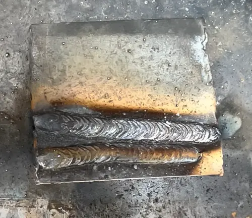 Welded metal plates with TITANIUM Stick 225 Inverter Welder.