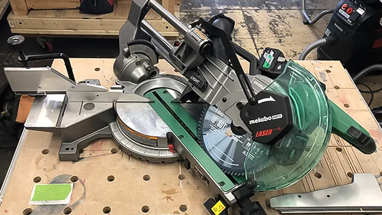 Metabo HPT C10FSHCT 10" Dual-Bevel Sliding Compound Miter Saw with Laser on a workbench