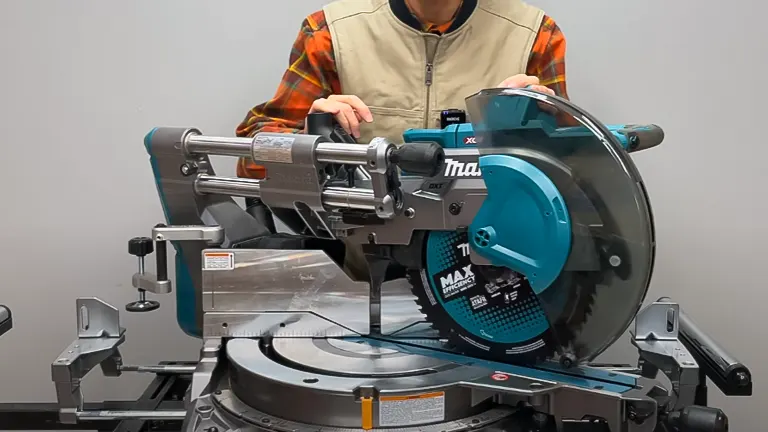 Person demonstrating the use of a Makita GSL04M1 40V Max XGT 12” Dual-Bevel Sliding Compound Miter Saw Kit