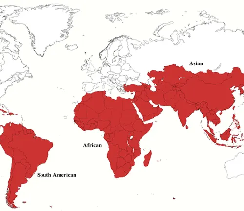 world map with continents outlined and areas where Moringa Trees are commonly found shaded in red