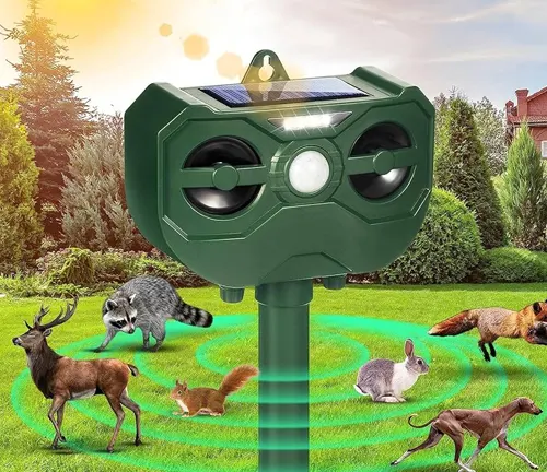 A green animal repeller device in a garden, emitting waves to deter various animals including rabbits