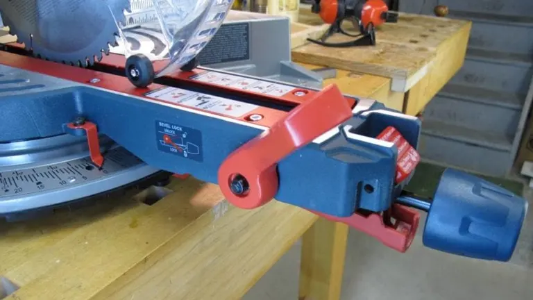 Miter saw on a wooden workbench in a workshop