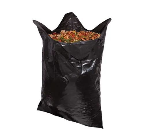 A black trash bag filled with leaves