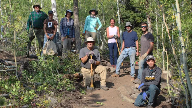 Group of people working outdoors in Shoshone National Forest