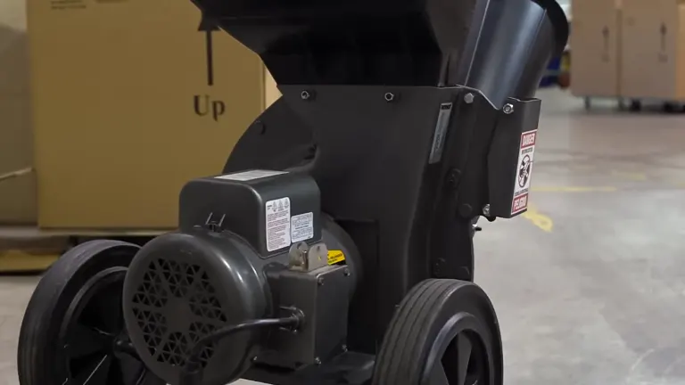 Close-up of a Patriot 1.5 HP Electric Wood Chipper Leaf Shredder in a warehouse