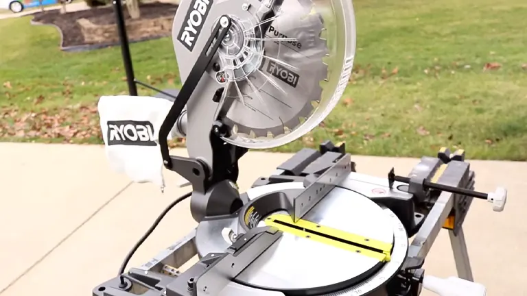 Ryobi TS1346 10” Sliding Compound Miter Saw with LED on a lawn