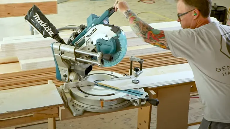 Person Using Makita Miter Saw in Workshop