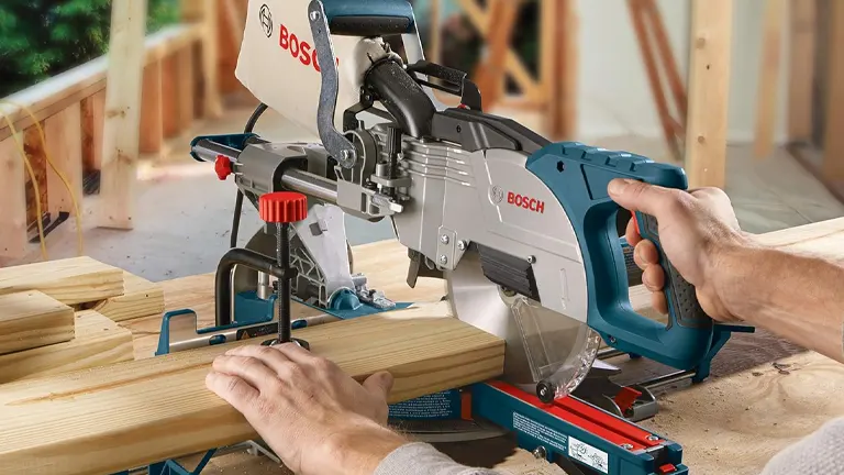 BOSCH CM8S 8-1/2” Single Bevel Sliding Compound Miter Saw in use on a wooden workbench