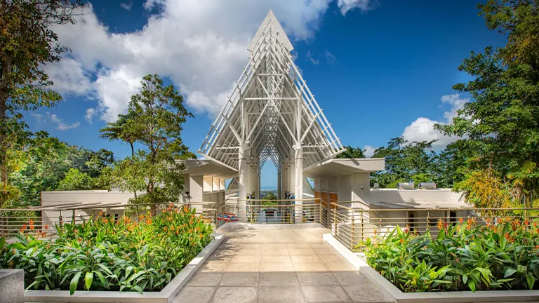 A modern architectural structure amidst lush greenery at El Yunque National Forest